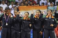 (L-R) Silver medalists Shamini Kumaresan, Mouma Das, Poulomi Ghatak, Prabhu Mamta and Madhurika Suhas Patkar of India show their medals at the table tennis women's team awards ceremony at the Yamuna Sports Complex as part of the XIX Commonwealth Games in New Delhi on October 8, 2010.
